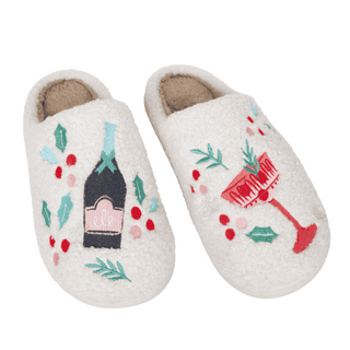 Pair of slippers with festive designs on a white background