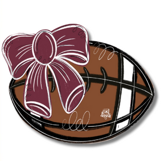 Decorative item with a bow on a football shape with 'DK MINI' branding.