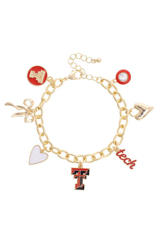 Gold bracelet with various charms including a letter 'T' and 'tech' on a white background
