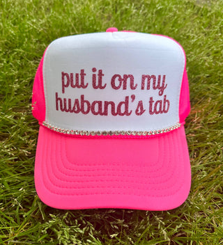 Put It On My Husband's Tab Trucker Hat: Black Split