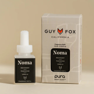 Guy Fox Noma fragrance refill bottle and packaging on a beige background