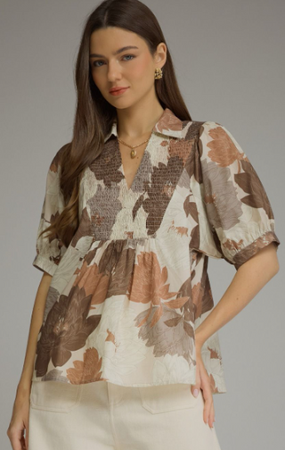 Floral short sleeve top with smocked V-neck yoke