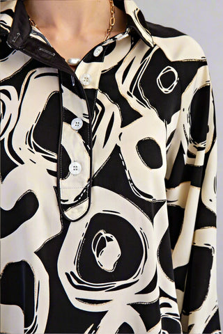 Black and white patterned shirt with abstract design
