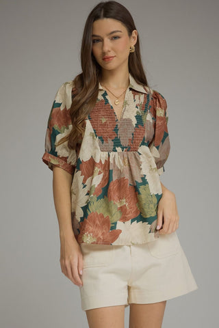 Floral short sleeve top with smocked V-neck yoke