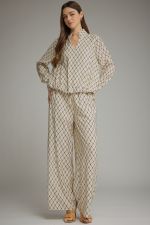 Geometric print long sleeve top with a split neckline