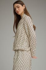 Geometric print long sleeve top with a split neckline