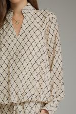 Geometric print long sleeve top with a split neckline